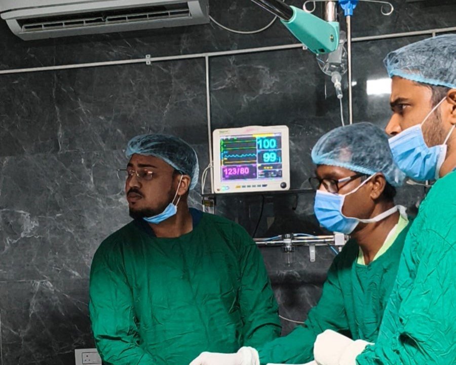 Dr. Arindam Acharyya performing laparoscopic surgery in the operating theatre at Kalyani